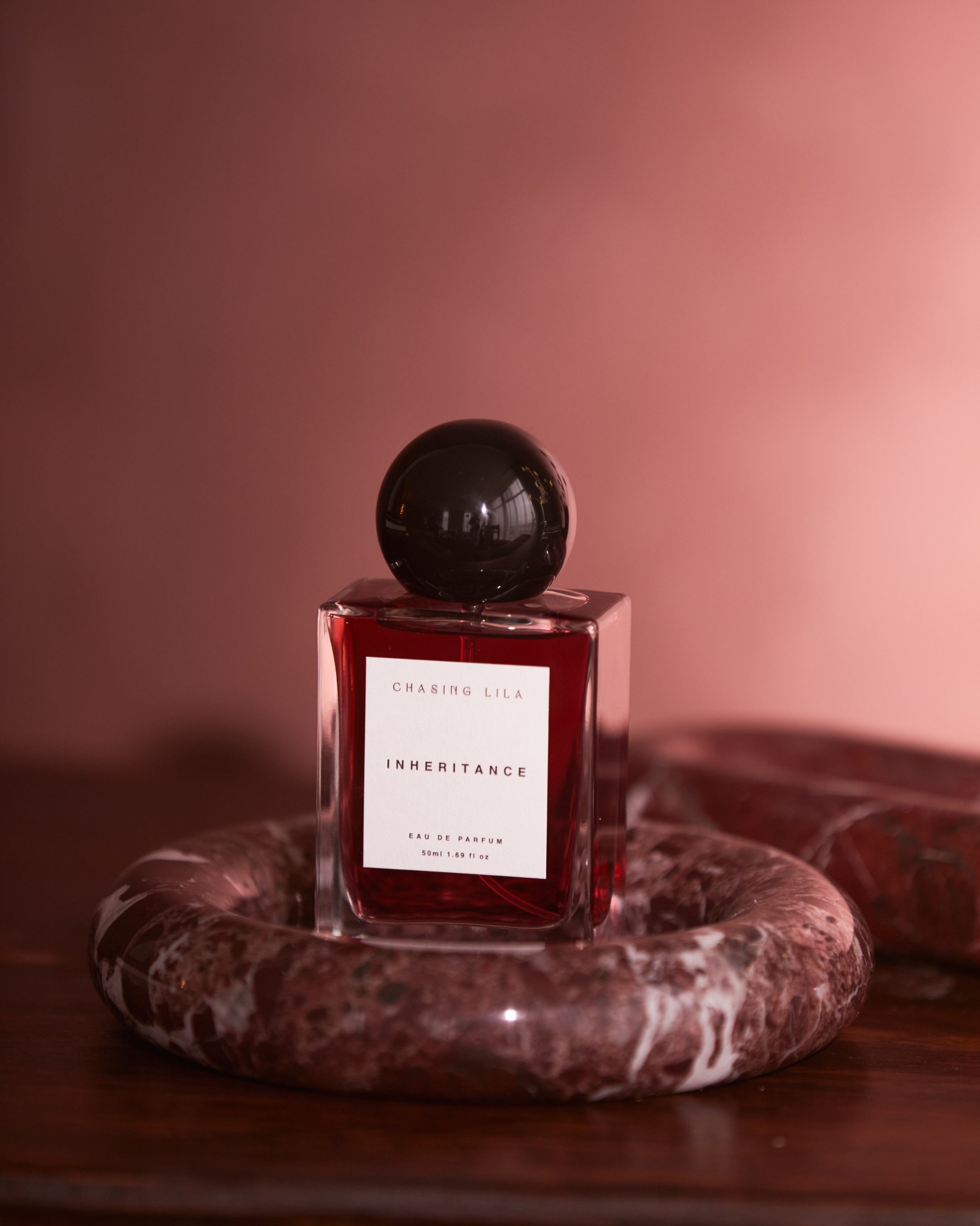 Chasing Lila Inheritance artisan perfume – bottle close-up with gold cap